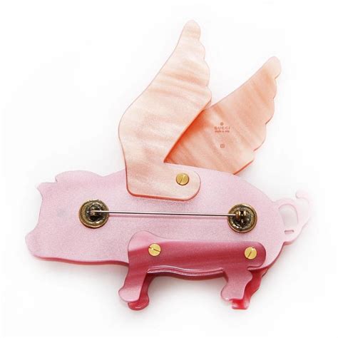 flying pig brooch gucci|gucci flying pig sweater.